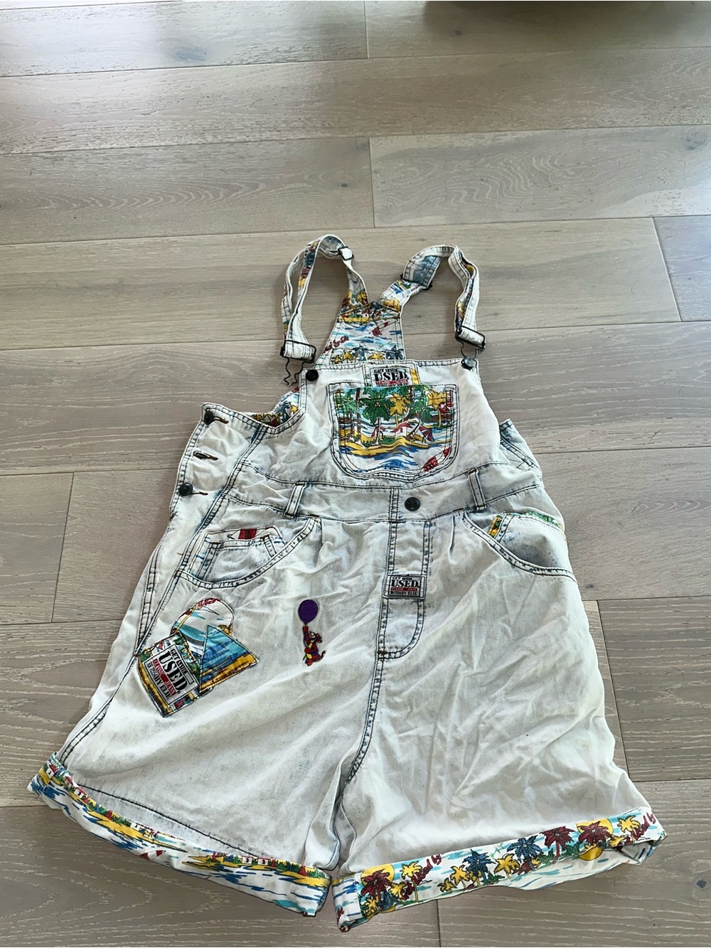 Vintage 1980s/1990s "Get Used by Elie" beach daffy tigger  denim shortalls M
